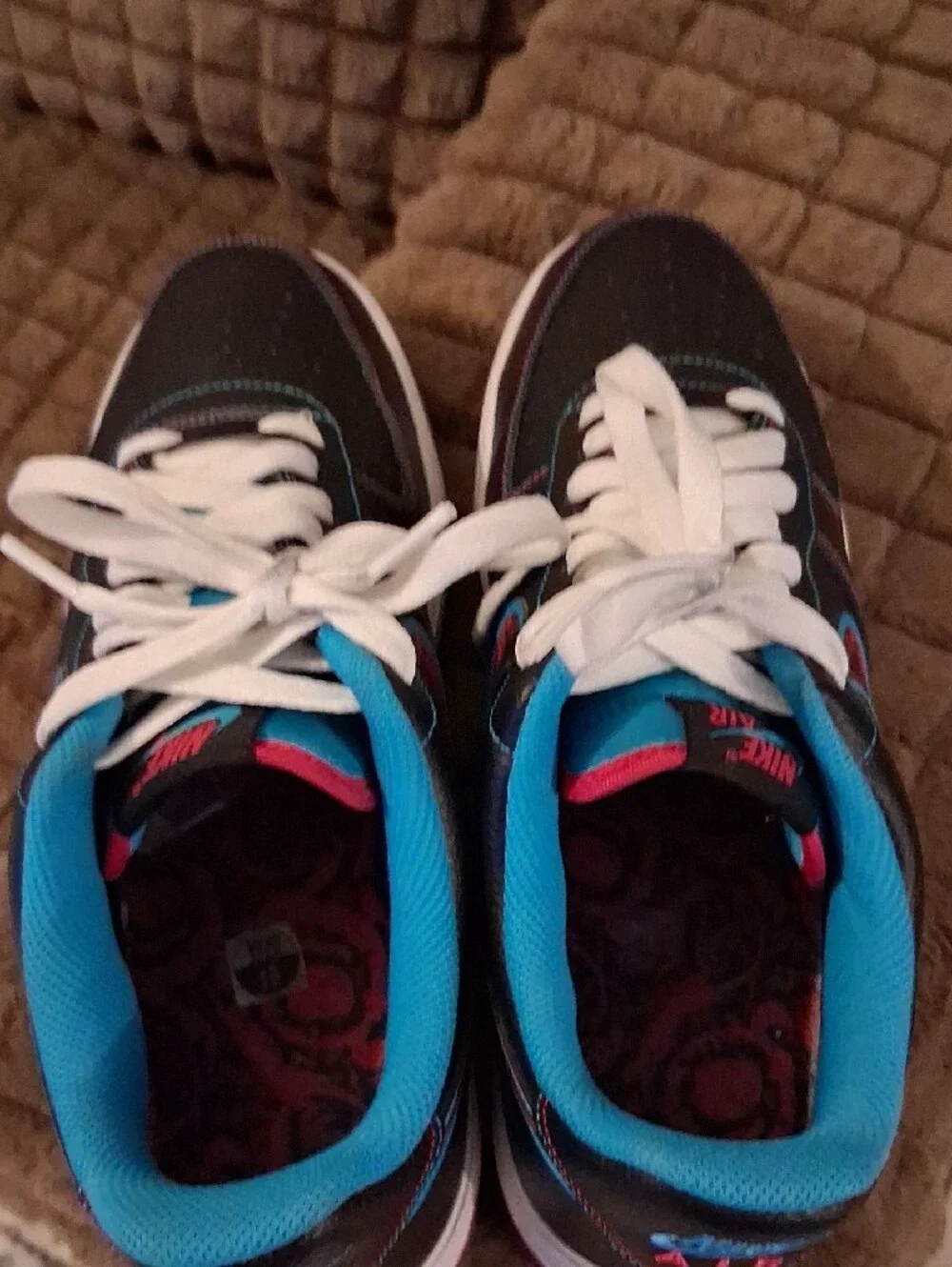 Nike Black Sneakers with Blue Lining and Red Patterned Swoosh